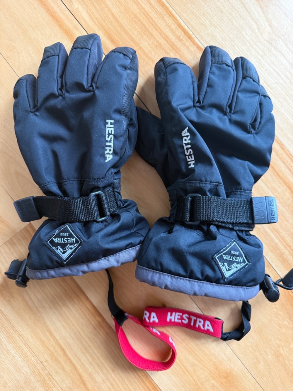 Hestra Black Gloves with Blue Logo Tag and Gray Trim